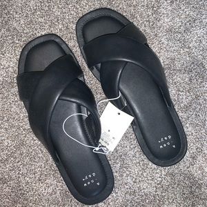 A. New. Day. Sandals